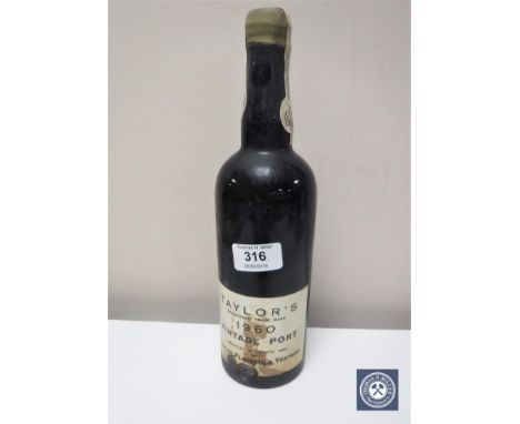 A bottle of Taylor's 1960 Vintage Port, bottled in Oporto in 1963 by Taylor, Fladgate &amp; Yeatman. 