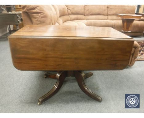 A Victorian mahogany drop leaf sofa table, width 105 cm.