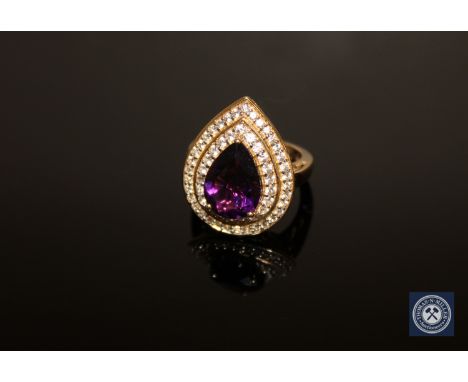 A 9ct gold amethyst and zircon cluster ring, size N/O CONDITION REPORT: 7.9g