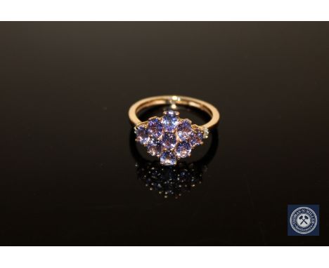 A 9ct gold tanzanite cluster ring, size L CONDITION REPORT: 2.3g