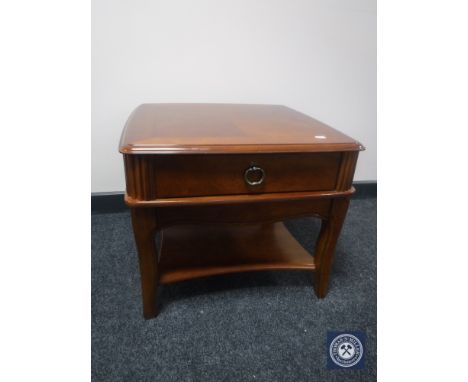 A reproduction lamp table fitted a drawer 