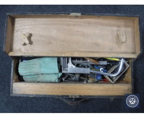 A joiner's tool box with hand tools 