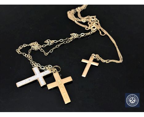 Two 9ct gold chains with silver crosses 