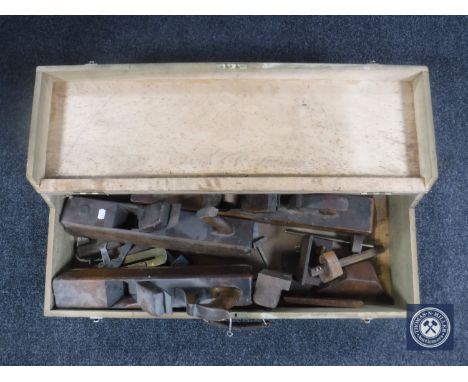 A joiner's tool box with wood working planes and joinery tools 