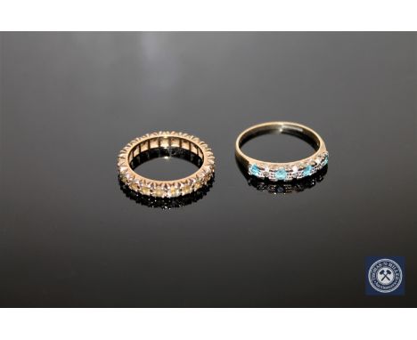 A 9ct gold synthetic spinel eternity ring and an aquamarine half-eternity ring  CONDITION REPORT: 3.7g