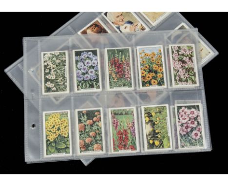 Cigarette Cards, Gallaher's,a modern album containing 9 various sets to include Army Badges, British Birds, Butterflies & Mot