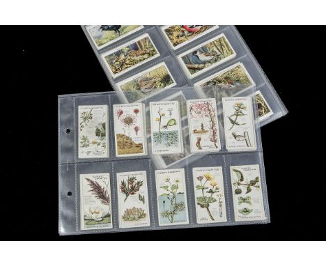 Cigarette Cards, Players,a modern album containing 11 various sets to include, Regimental Uniforms (brown back), Regimental U