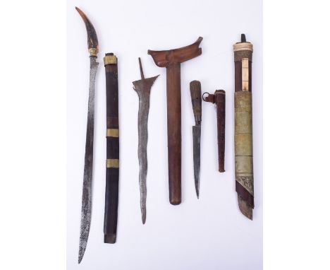 Malayan Kris in wooden sheath (hilt missing); Malayan short sword with natural staghorn hilt, in wooden scabbard; another mis