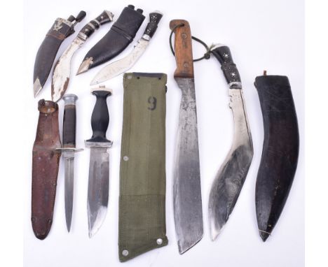 British Army Martindale Machete, with two piece wooden grips, housed in the original green canvas scabbard. Sharpened edge bl