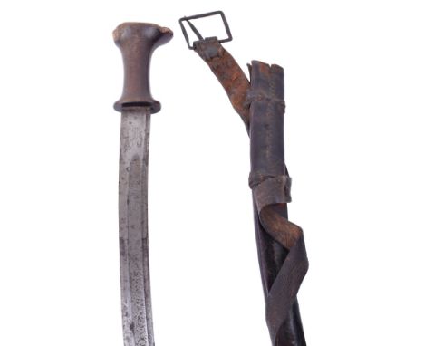 ^Ethiopian Sword Shotel, fitted with a large one piece carved rhinoceros horn hilt (pommel chipped) surmounted by an Italian 