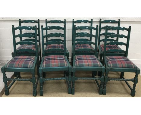 A set of eight modern green stained ladder back dining chairs with upholstered seats on bobbin turned front legs