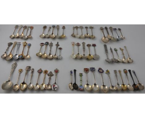 Twelve English and European silver tea and souvenir spoons some with enamel decoration together with a large quantity of silv