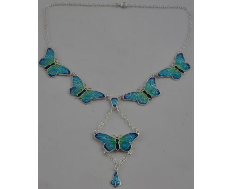 A decorative silver and enamel set necklace