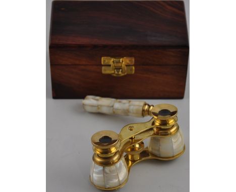 A pair of Mother of pearl opera glasses with wooden case. 