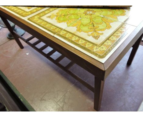 A 1970s rectangular teak tile top table, l:105cm