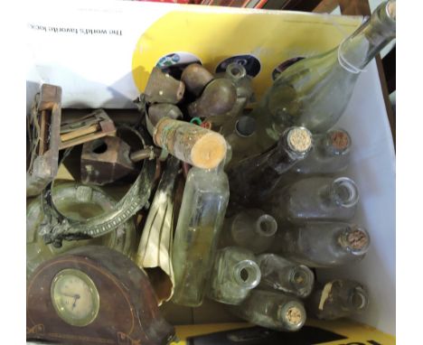 An Edwardian mahogany mantel timepiece together with a quantity of assorted pharmaceutical glass bottles, a horn cornucopia v