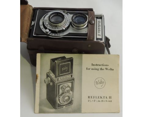 A Welta Reflekta II twin lens camera circa 1950 cased with instruction booklet