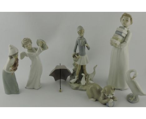 A Lladro porcelain figure, goose girl with parasol, together with a Lladro porcelain girl with cockerel, a Lladro goose and k