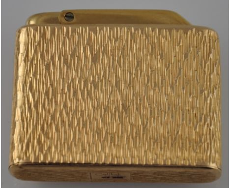 A Colibri 14ct yellow gold cased gas cigarette lighter with bark effect body, circa 1970