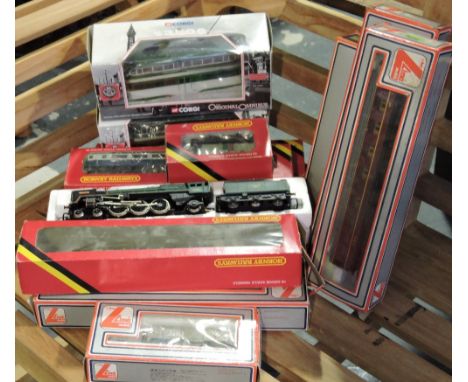 A Hornby 00 guage Brittania 4-6-2 locomotive and tender together with a diesel locomotive, 2 BB coaches, assorted Lima rollin