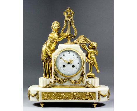 A 19th Century French gilt brass and white marble cased mantel clock by Japys Freres No. 8204, the 4ins diameter white enamel
