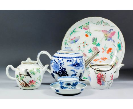 A small collection of Chinese ceramics, including a blue and white tea bowl and saucer, painted with precious objects, the ba