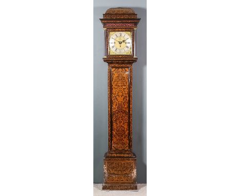 A late 17th Century walnut and marquetry longcase clock by Isaac Goddard of London, the 12ins square brass dial with wide sil