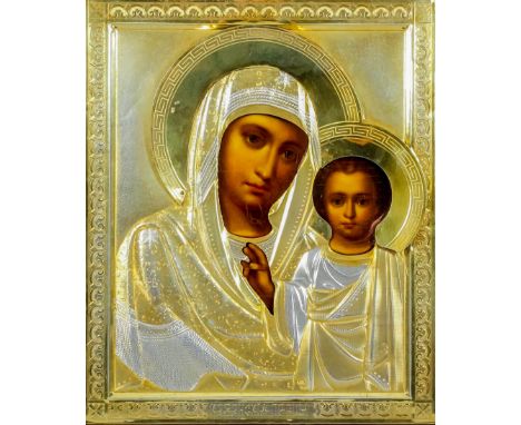 A late 19th Century Russian icon depicting Kazan - "Mother of God", depicting the Madonna and Christ child, with ornate silve