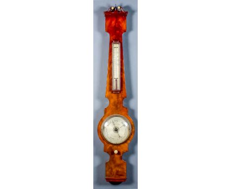 A 19th Century figured mahogany cased wheel barometer and thermometer by James Braham, 8 Strand, Torquay, with 6ins diameter 