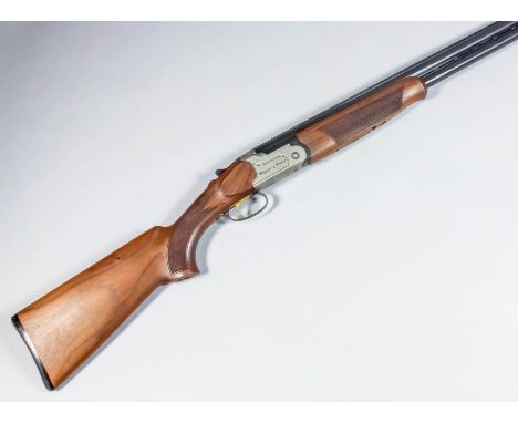 A 12 bore over and under shotgun by Webley &amp; Scott, model 912, Serial No. TRAN08134OU, the 30ins blued steel barrels fitt