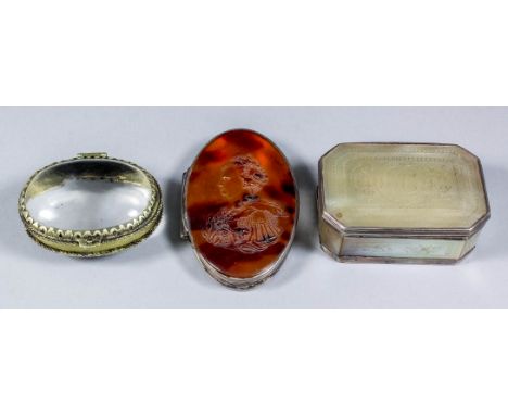 An 18th Century silvery metal oval snuff box, the lid in pressed tortoise-shell with raised profile of Queen Anne (?), 3.25in