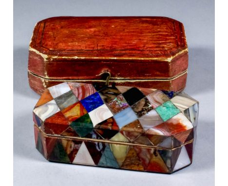 A 19th Century "Specimen" stone covered octagonal snuff box with gilt metal mounts, the whole covered in lozenge shaped panel