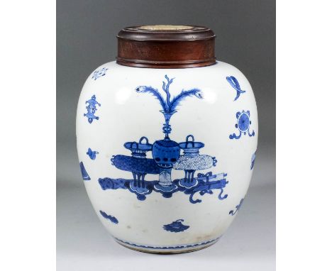 A Chinese blue and white porcelain ginger jar painted with vases of flowers, censors, scrolls, and other motifs, 9ins (22.9cm