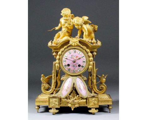 A late 19th Century French gilt metal and porcelain mounted mantel clock by Japy Freres, No. 149, the 3.25ins diameter porcel