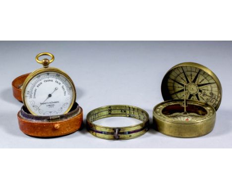 A late 19th Century gilt brass cased pocket barometer by Negretti &amp; Zambra, London, No. 17710, with 1.875ins diameter whi