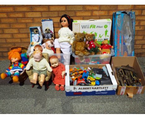 A good mixed lot to include two boxes of bears, Nintendo Wii Fit Plus, three rail Hornby OO gauge track, a Steiff bear, two M