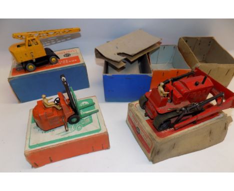 Dinky:- 571 Coles crane, 14C fork lift and 561 Dozer, each boxed.