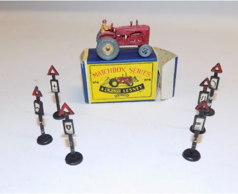 Matchbox :- 4  tractor, together with six road signs.