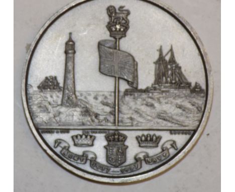 An 1897 Queen Victoria Jubilee Army and Navy token.