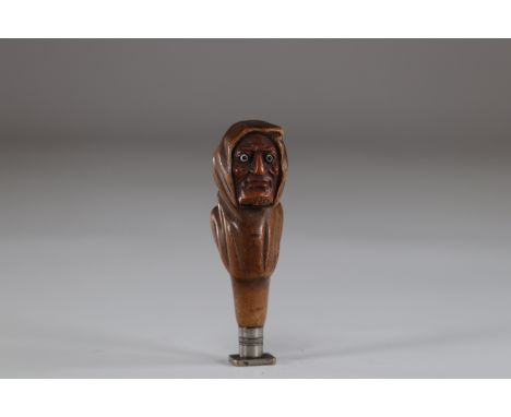 Grotesque head carved wooden sealSizes: H=110mm L=50mmWeight (K): 0.044kg