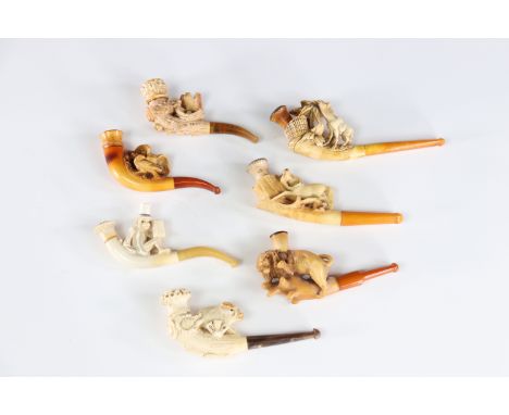 Lot of 7 pipes in foam and amber various animal subjectsSizes: diversWeight (K): 0.150kg