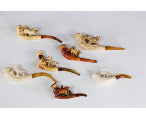 Lot of 7 amber and foam pipes decorated with horsesSizes: diversWeight (K): 0.170kg
