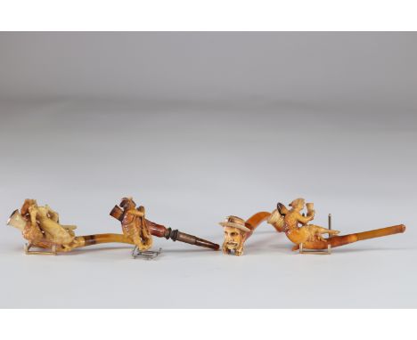 Lot of 4 beautiful amber and foam pipes various character decorationsSizes: diversWeight (K): 0.090kg