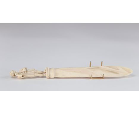Sumptuous letter opener surmounted by a young boy Dieppe 19thSizes: H=300mmWeight (K): 0.075kg