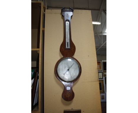 A 19th Century mahogany inlaid wheel barometer, the silvered dial marked Gilardone & Co. Exeter