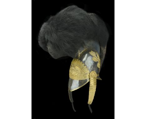 A Household Cavalry Officer’s 1817-32 Pattern Helmet. A scarce example, the silvered skull complete with gilt fittings, laure
