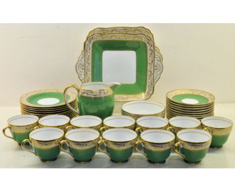 A Spode Copelands china Oaklea pattern Teaset with a border design of leaves and acorns, comprising twelve cups, eleven sauce