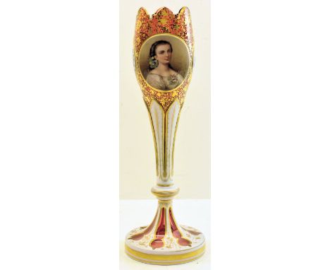 A Bohemian overlaid glass Vase decorated with portrait and floral panels on a gilt and pink glass ground.  14" (36cms) high. 