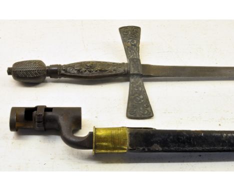 A Victorian Bayonet with brass mounted leather scabbard and a Ceremonial Sword with brass hilt. 