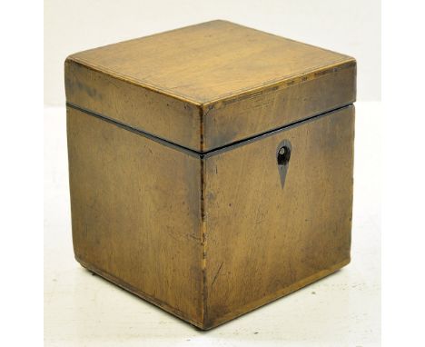 An early 19th Century mahogany square Tea Caddy, the hinged lid with chequer banded inlaid, the interior with a single covere